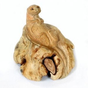 Otter - parasite wood carving