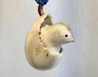 Handcarved Miniature Sculpture: Hatching Bird in Egg - Traditional Kimono Decor - Artisan Crafted Pendant - Symbol of New Beginnings