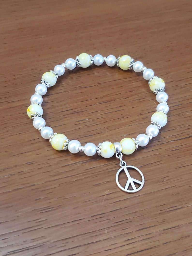 Beaded Stretch Bracelet Hippie Boho Gift Sunshine Yellow and White with a Peace Sign Charm Bohemian Summery