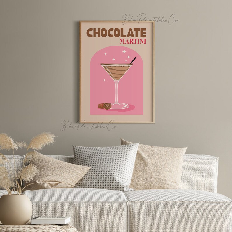 May include: A printable poster with a pink background and a brown martini glass filled with a chocolate drink. The text "CHOCOLATE MARTINI" is in brown and red letters.