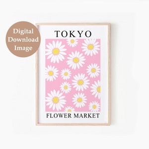 May include: A printable art print with a pink background and white daisies with yellow centers. The text "TOKYO FLOWER MARKET" is at the bottom of the print.