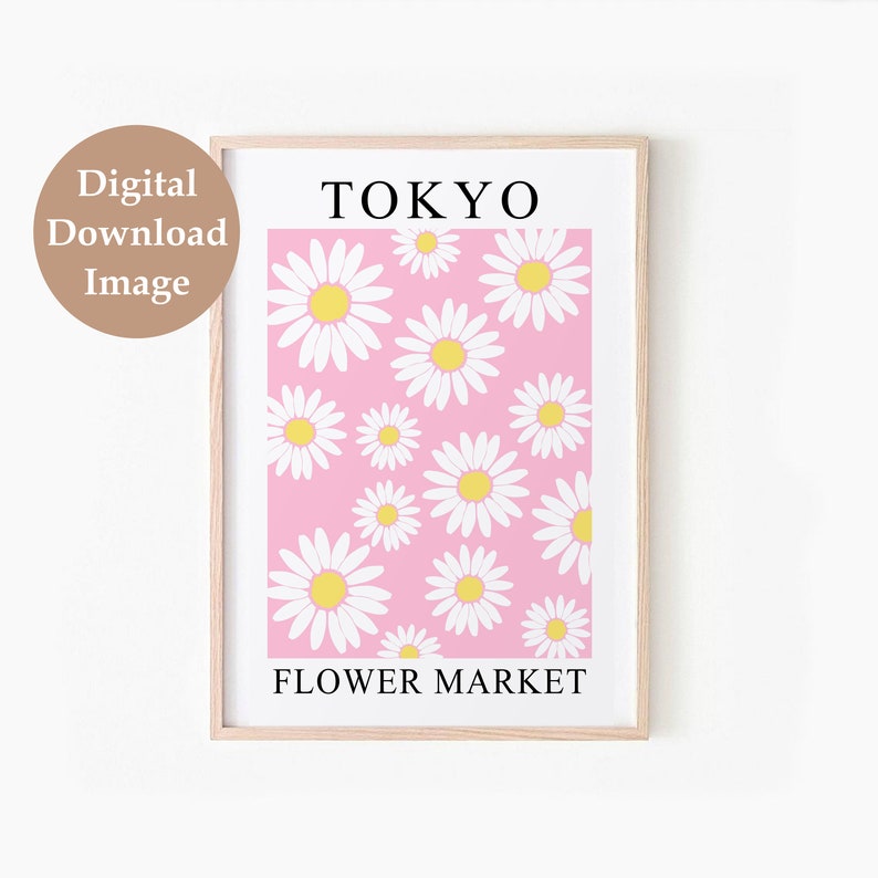 May include: A printable art print with a pink background and white daisies with yellow centers. The text "TOKYO FLOWER MARKET" is at the bottom of the print.