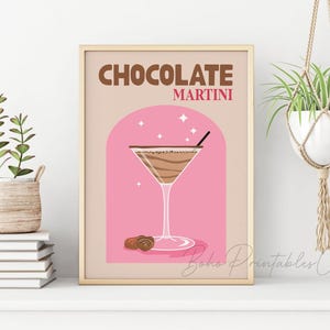 May include: A printable poster with a pink and brown background featuring a martini glass filled with a chocolate martini. The text "CHOCOLATE MARTINI" is in brown letters on the poster.