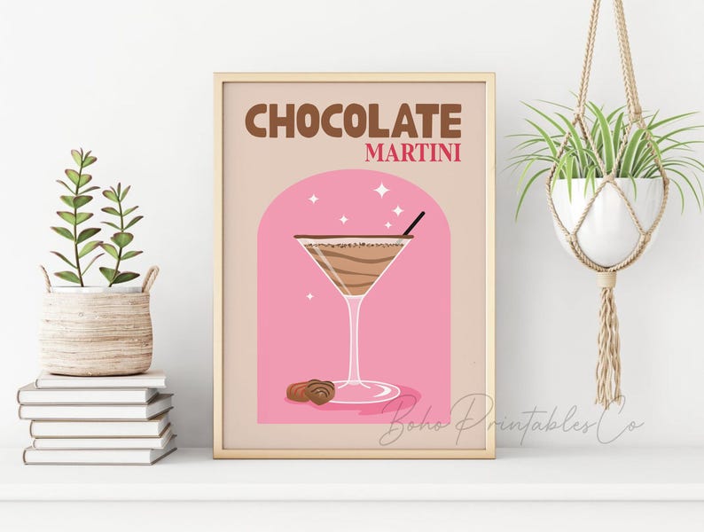 May include: A printable poster with a pink and brown background featuring a martini glass filled with a chocolate martini. The text "CHOCOLATE MARTINI" is in brown letters on the poster.