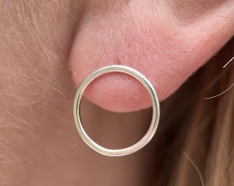 Sterling silver tiny circle stud earrings