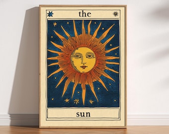 May include: A vintage-style illustration of the sun with a human face, surrounded by stars on a blue background. The text "the sun" is printed below the image.