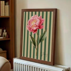 Bring charming, old-fashioned elegance to your space with this Vintage Floral Stripe Print. Featuring nostalgic vertical stripes and delicate flowers, this artwork embodies a timeless cottagecore aesthetic with a touch of vintage charm. Inspired by classic wallpaper patterns and antique botanical prints, it’s perfect for creating a warm and inviting atmosphere in any room.