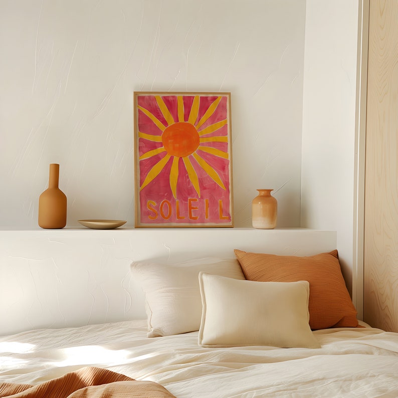 This soleil poster bursts with vibrant energy and retro charm, perfect for evoking a trendy summer vibe in bright pink, orange and yellow! The central element is an abstract sun, drawn with a playful and whimsical hand.