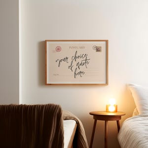 Choose whatever quote or phrase you'd like to be displayed on the art, a personalised postcard print. Designed in a vintage postcard style with elegant handwritten typography, this piece makes a beautiful addition to cozy living rooms, entryways, bedrooms, or gallery walls. Bring a touch of warmth and comfort into your space with this personalised custom quote print. Choose whatever quote or phrase you'd like to be displayed on the art.