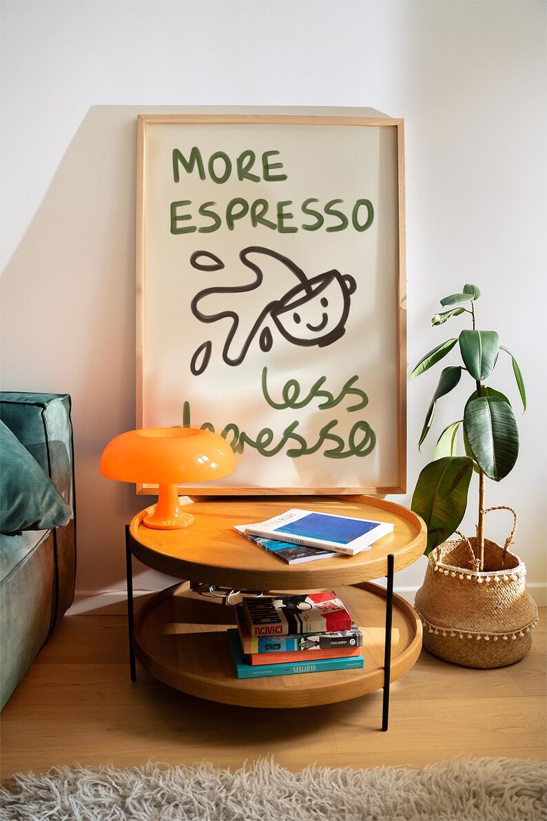 More espresso less depresso hand painted poster. The subtle brushstroke textures add an artistic flair, all set against a clean, beige background. Perfect for coffee enthusiasts, this chic,  creative poster is a stylish addition to modern apartments.