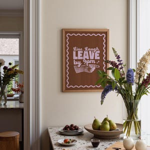 Make your guests laugh (before they leave at 9!)
Live laugh leave by 9pm, a funny, playful twist on the phrase we all love to hate.
A great hallway/entryway poster, or housewarming gift!