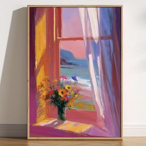 May include: A framed painting of a coastal scene viewed through a window. A vase of colourful flowers sits on the windowsill. The window reveals a beach, ocean, and sky in shades of pink, blue, and green.
