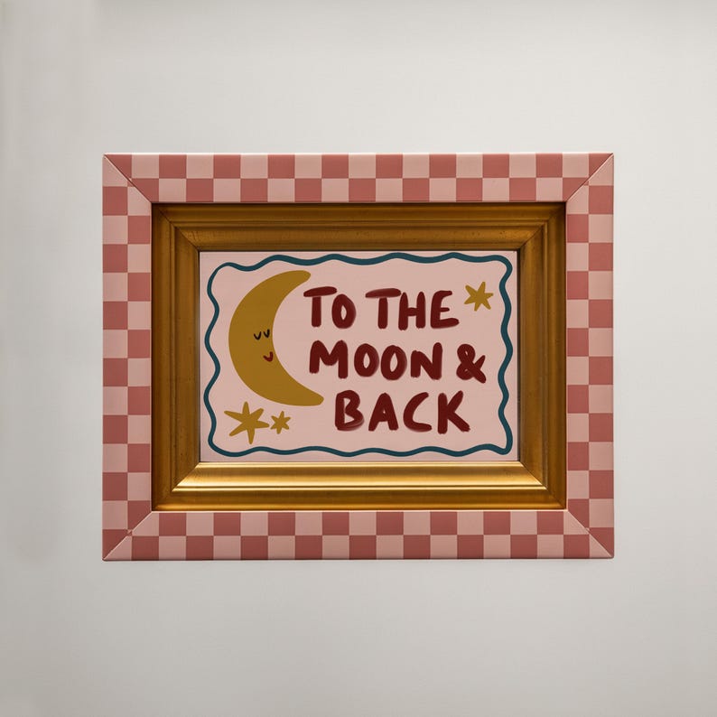 Hand-drawn children’s illustration featuring the phrase “To the Moon & Back” in bold, brush-style lettering with a soft, painterly texture. A smiling crescent moon with simple closed eyes appears beside the text, accompanied by small star shapes that add a gentle, playful feel. A wavy hand-drawn border frames the artwork, giving it a cosy, retro look. The overall style is warm, friendly and nostalgic, with an imperfect hand-painted aesthetic designed to feel comforting and child-friendly.