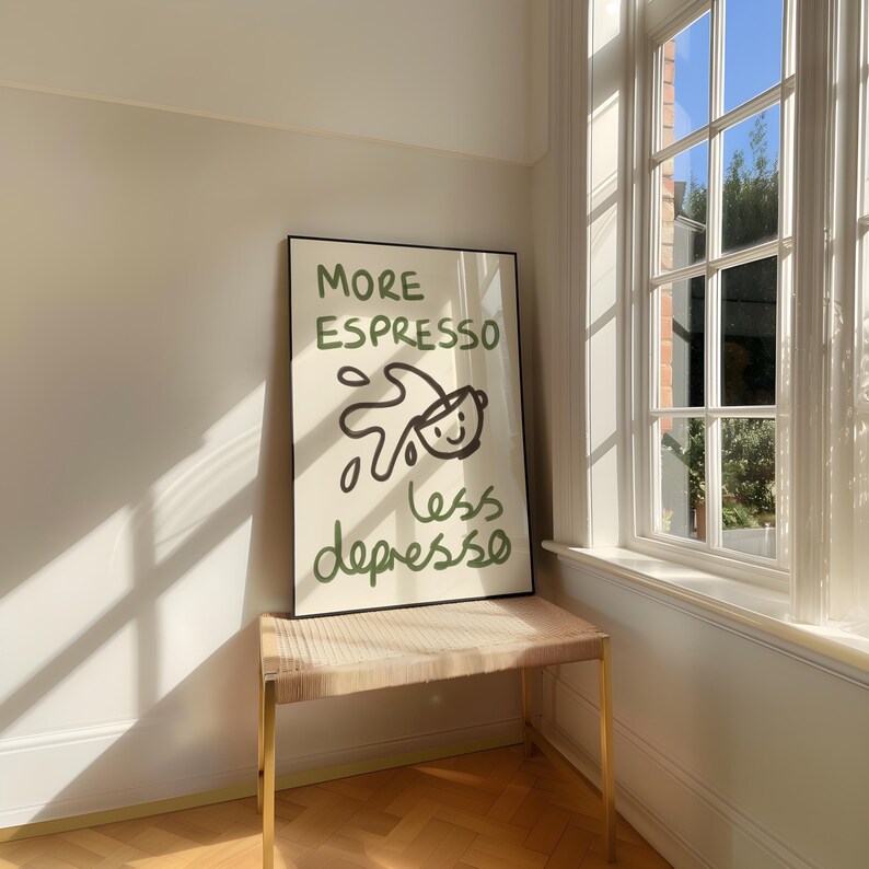 More espresso less depresso hand painted poster. The subtle brushstroke textures add an artistic flair, all set against a clean, beige background. Perfect for coffee enthusiasts, this chic,  creative poster is a stylish addition to modern apartments.