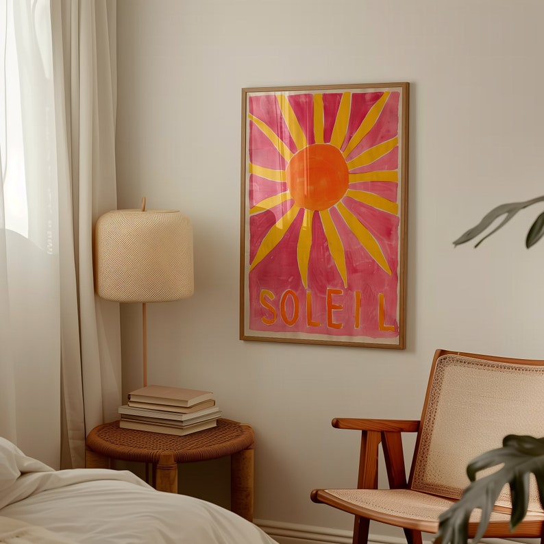 This soleil poster bursts with vibrant energy and retro charm, perfect for evoking a trendy summer vibe in bright pink, orange and yellow! The central element is an abstract sun, drawn with a playful and whimsical hand.