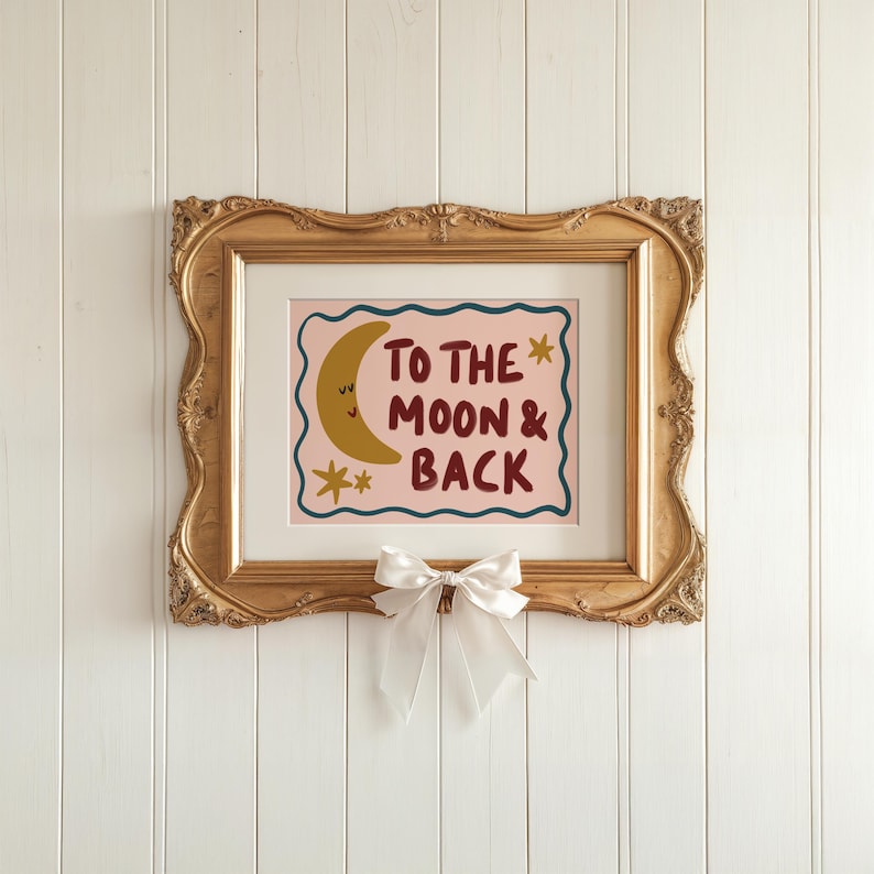 Hand-drawn children’s illustration featuring the phrase “To the Moon & Back” in bold, brush-style lettering with a soft, painterly texture. A smiling crescent moon with simple closed eyes appears beside the text, accompanied by small star shapes that add a gentle, playful feel. A wavy hand-drawn border frames the artwork, giving it a cosy, retro look. The overall style is warm, friendly and nostalgic, with an imperfect hand-painted aesthetic designed to feel comforting and child-friendly.