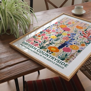 A stunning, colourful British Countryside flowers print. 
Add a fun yet timeless poster to your home, whether that be in your living room, or kitchen it will be sure to brighten up your space.