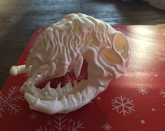 Trophy skull inspired by a Universal Studios trophy room. I like to think it is from the same planet as the T-rex skull from predator 2