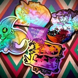 May include: Four holographic stickers featuring colourful cartoon characters. The stickers are on a patterned background. The text "any three stickers! £10" is visible in the image.
