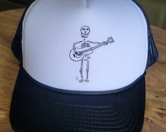 Skeleton Playing Guitar Trucker Hat