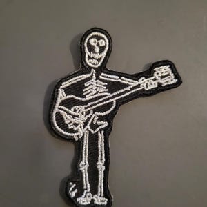 Sew On Patch | Skeleton Playing Guitar