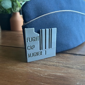 May include: A rustic wooden sign with the text "Welcome to our home" in white lettering. The sign features a distressed finish and a simple, inviting design, perfect for entryway decor.