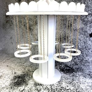 Rotating Cupcake Carousel Stand: White Waterproof Plastic, Holds 8 or 12