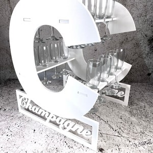 Escalera para champán, con forma de C. Carrito para champán y soporte para Prosecco. Plástico blanco. Disponible en varios tamaños con capacidad para 8, 16 y 24 botellas.