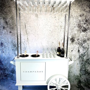 Champagne cart,drinks cart,champagne bar.Freestanding.Holds 40+ champagne flutes & 2 ice buckets.transportable.Stand out piece