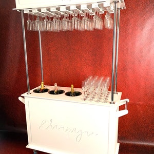 Champagne cart, drinks cart, champagne bar. Freestanding. Holds 60+ champagne flutes & 3 ice buckets. Moveable. Collapsible. Moves on wheels