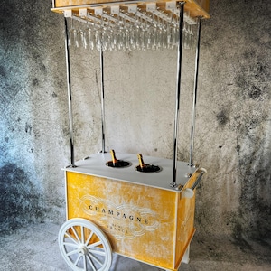 Champagne cart, Drinks cart, Champagne Bar. FloorStanding 6.7ft Tall. Holds 42 champagne flutes & 2 ice buckets. Transports Easily