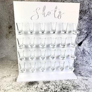 White Plastic Shot Wall Display: Freestanding Shot Stand
