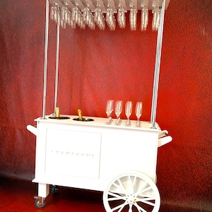 Champagne cart,drinks cart,champagne bar.Freestanding.Holds 40 champagne flutes & 2 ice buckets.transportable.Stand out piece image 2