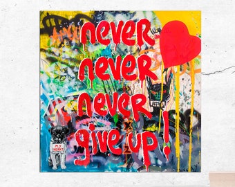 May include: A colorful graffiti art print with the words "never never never give up!" in red paint. A red heart is in the upper right corner of the print. A small black and white dog with a sign that says "my heart" is in the lower left corner.
