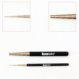 May include: Two Beadsmith brand mandrels for jewelry making. The mandrels are made of metal and have a black handle. The mandrels are extended to show the different sizes.