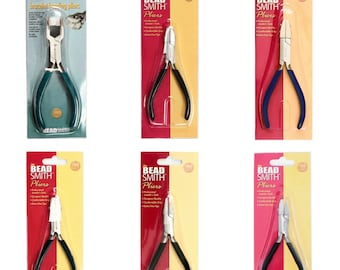 May include: Six pairs of Bead Smith pliers packaged on individual cards. The pliers are black with silver tips and have different jaw shapes. The cards are red and yellow with the Bead Smith logo and product information.