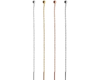 May include: Four long chain earrings with a small ball at the top and a straight bar at the bottom. The earrings are available in silver, gold, rose gold, and black.
