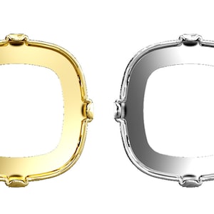 May include: Two decorative frames, one gold and one silver, with a rounded square shape and a raised edge. The frames are empty.