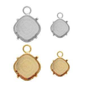 May include: Four bezel settings for jewelry making, two in silver and two in gold. The settings are square with rounded corners and have a loop at the top for attaching to a chain or cord.