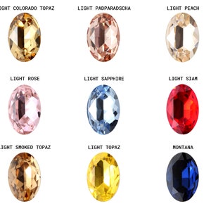 Pode incluir: Nove pedras preciosas ovais em v&aacute;rias cores, incluindo top&aacute;zio Colorado claro, padparadscha claro, p&ecirc;ssego claro, rosa claro, safira clara, Siam claro, top&aacute;zio fumado claro, top&aacute;zio claro e Montana.