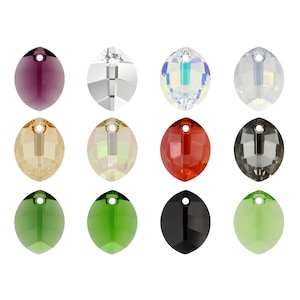 May include: Assortment of 12 crystal teardrop pendants in various colours, including clear, red, green, black, and purple. Each pendant has a small hole at the top for stringing.