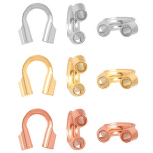 Könnte beinhalten: Drei Sätze Schmuckverschlüsse in Silber, Gold und Roségold. Jedes Set enthält einen einzelnen Verschluss und einen doppelten Verschluss.