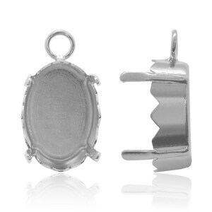May include: Silver-toned oval pendant setting with a loop at the top for attaching a chain or cord. The setting is designed to hold a cabochon stone.