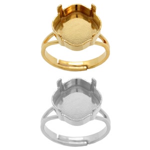 May include: Two adjustable rings with a bezel setting for a cabochon stone. The ring on the top is gold, and the ring on the bottom is silver.