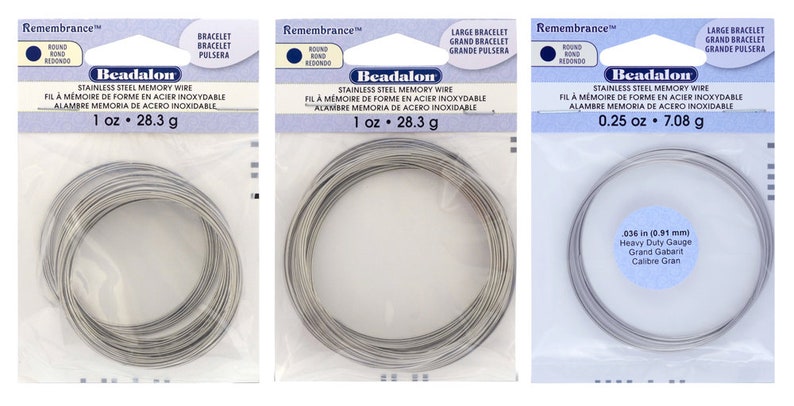 May include: Three packages of stainless steel memory wire for jewelry making. The packages are labeled with the brand name Beadalon and the weight of the wire in ounces and grams. The wire is shown coiled in a circle.