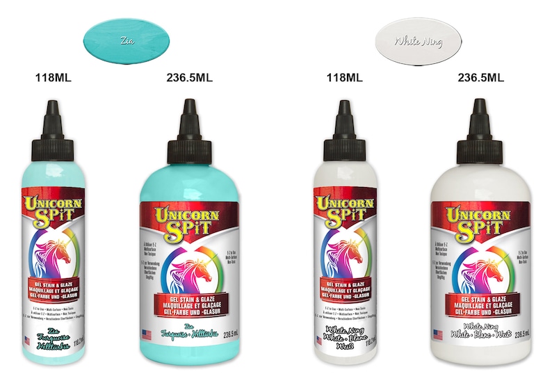 May include: Two bottles of Unicorn Spit gel stain and glaze in turquoise blue and white. The bottles are labeled with the Unicorn Spit logo and the color names "Turquoise Milkshake" and "White Wing White". The bottles are available in two sizes: 118 ml and 236.5 ml.