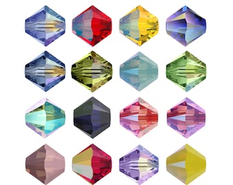 Könnte beinhalten: Sortiment von 12 facettierten Glasperlen in verschiedenen Farben, darunter Blau, Rot, Gelb, Grün, Lila und Pink. Jede Perle hat eine sechseckige Form mit einer spitzen Ober- und Unterseite.