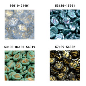 May include: Assortment of glass beads in various colors and patterns. The beads are shaped like leaves and have a glossy finish. The beads are arranged in four groups, each with a different color and pattern.