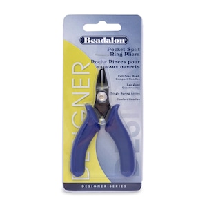 May include: Blue pocket split ring pliers with a yellow and white packaging card. The card reads "Beadalon Designer Series Pocket Split Ring Pliers" and lists features like "Full-Size Head, Compact Handles, Lap Joint Construction, Single Spring Action, Comfort Handles".