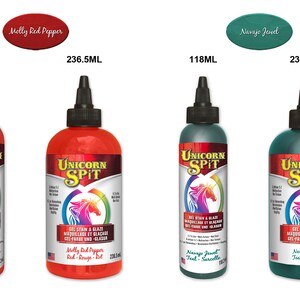 May include: Two sizes of Unicorn Spit gel stain and glaze in the colors Molly Red Pepper (red) and Navajo Jewel (teal). The bottles are labeled with the product name, color name, and size in milliliters.
